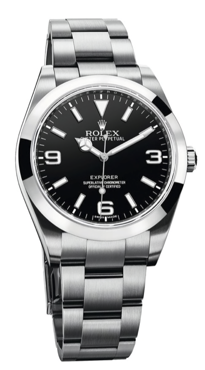 Stainless Steel Rolex Watch with Black Dial with Oystershell Case. On the face it says Explorer and there are three large numerals at the 3,6,9 position. Also says  Superlative Chronograph Officially Certified.