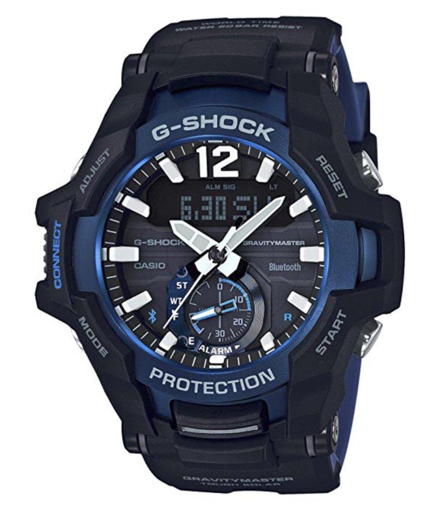 Rugged black watch with blue face and illuminated hands and candles.